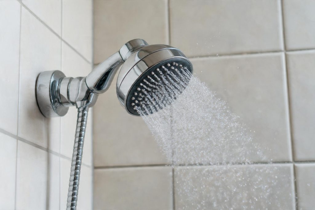 Fine aerosol spray from a shower head, the classic way legionella becomes breathable