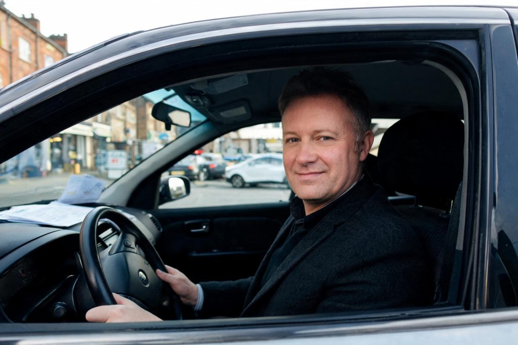 Private hire driver at the wheel of a licensed vehicle